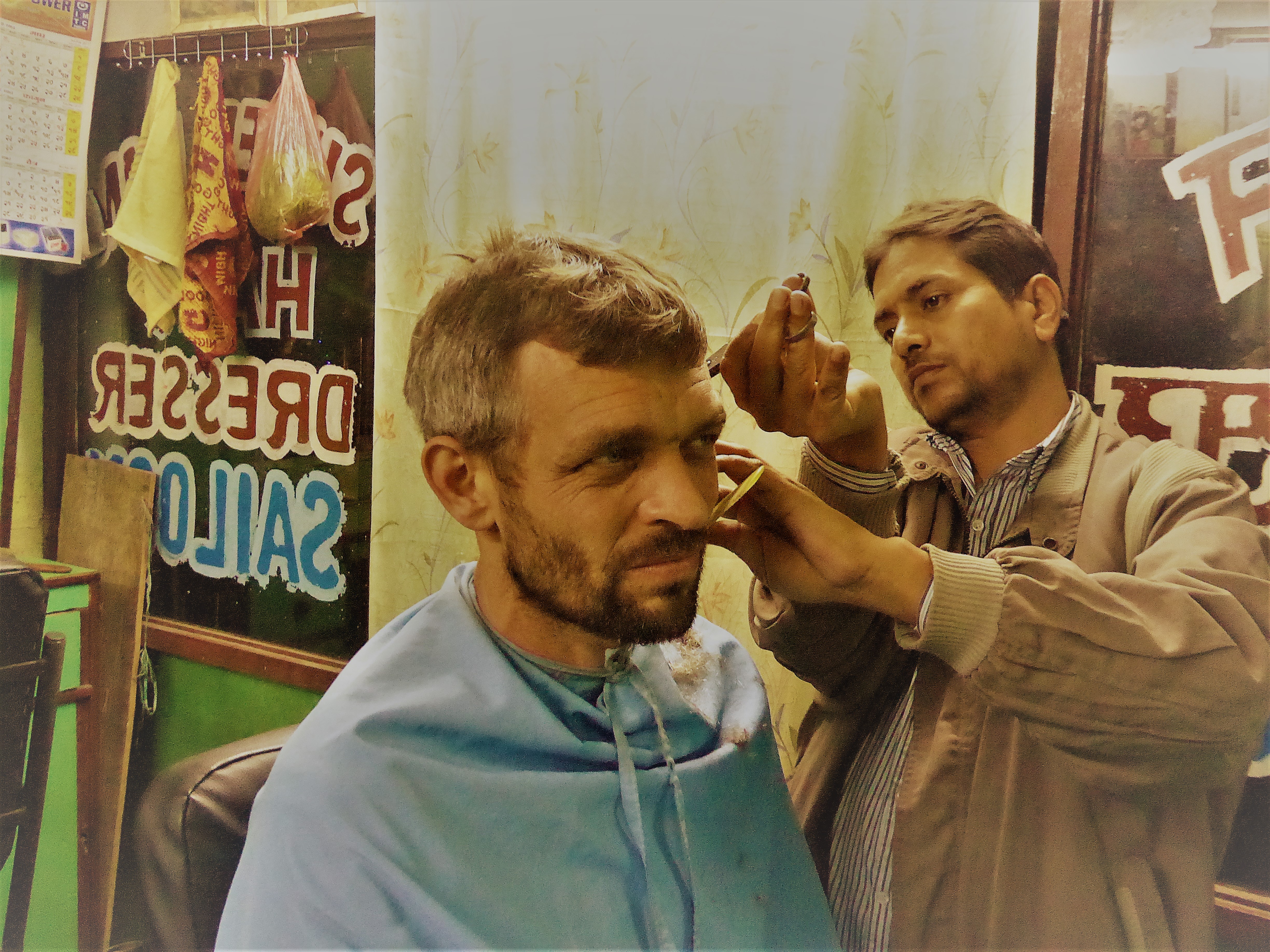 Magnus Wolfe Murray at his Kathmandu barber. Photo by Rupert Wolfe Murray.